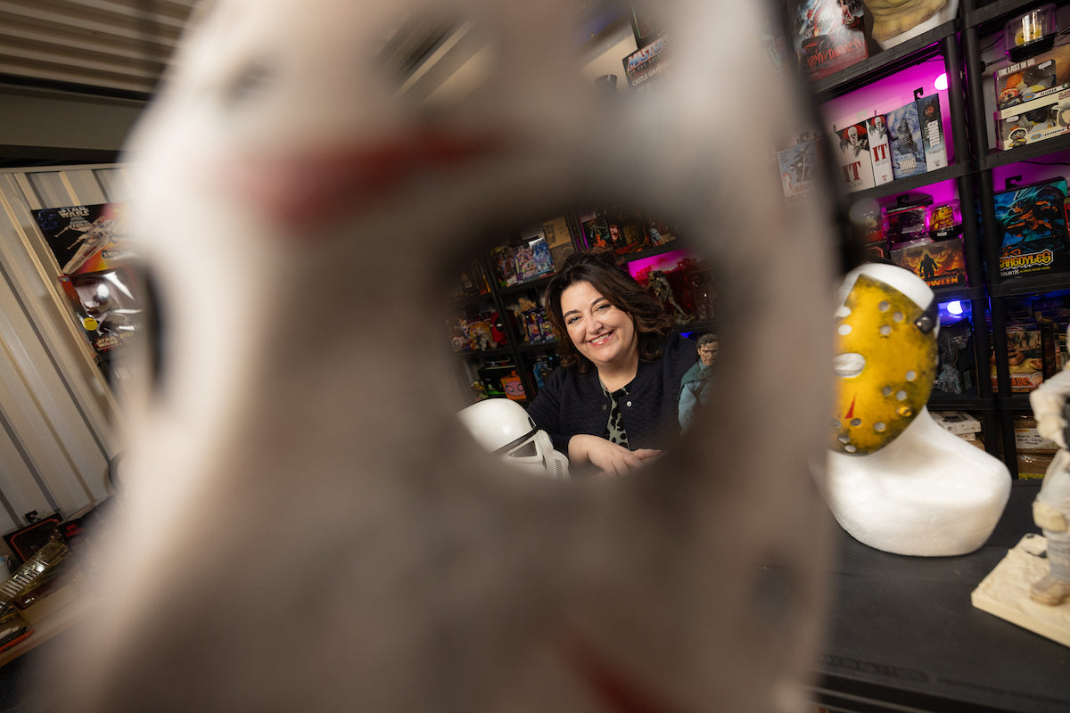 Kim Mooney - owner of Uncanny Collectibles in her Showroom