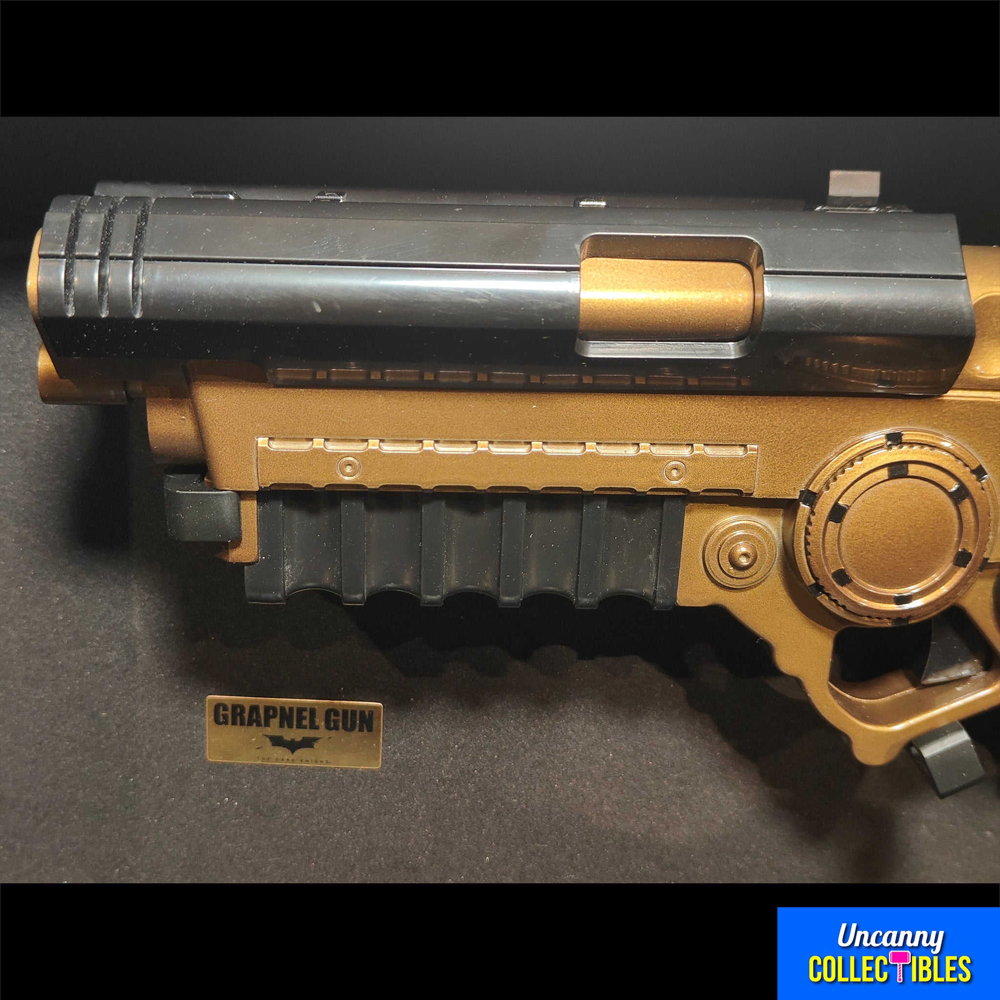 Batman The Dark Knight Replica 1/1 Grapnel Gun The Noble Collection – Batman, The Noble Collection, 60 cm, 2012, pre-owned collector piece, Uncanny Collectibles Dublin Ireland