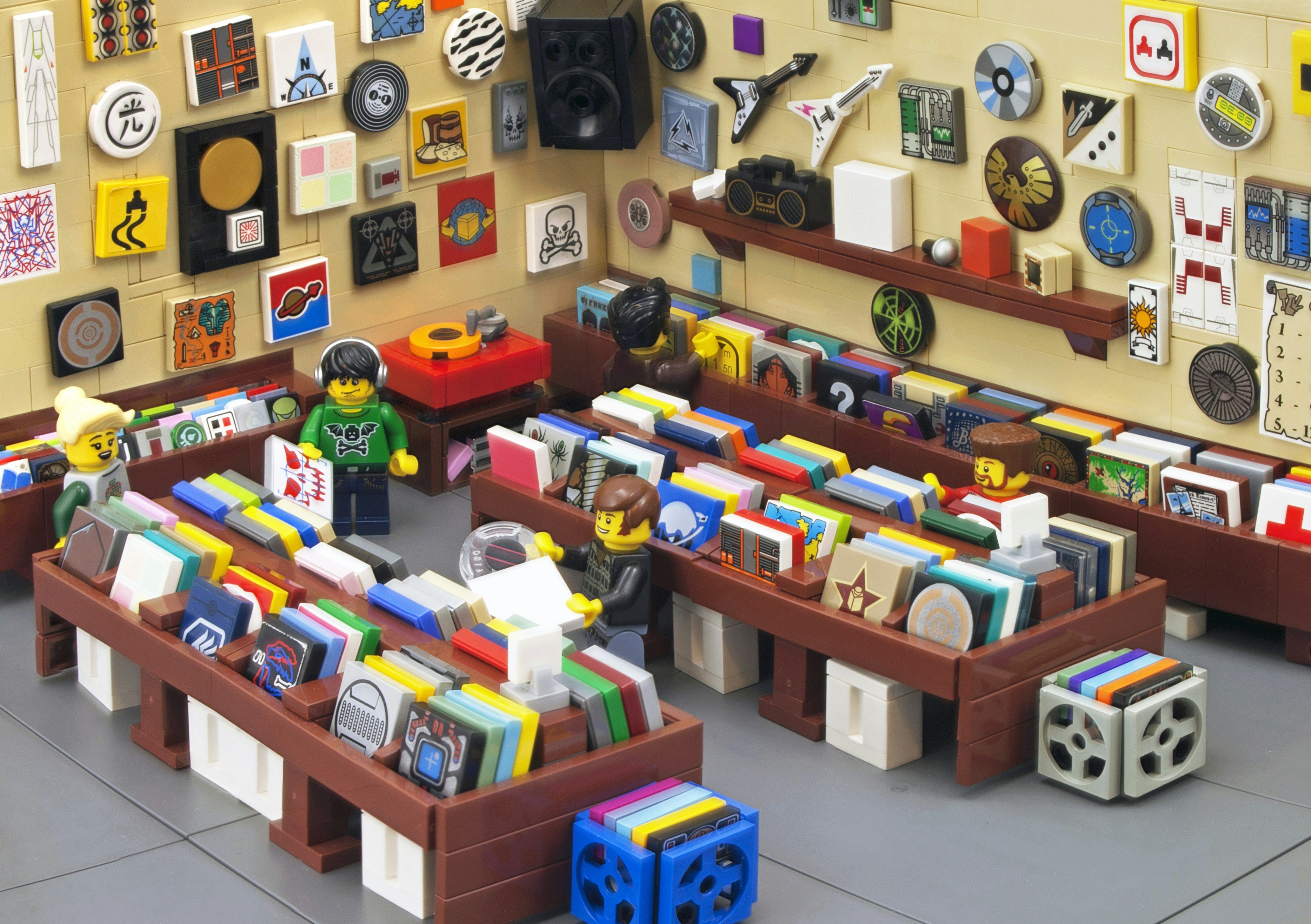 Colourful LEGO scene of a bustling record shop with minifigures browsing rows of albums, symbolising trading collectibles with dealers.