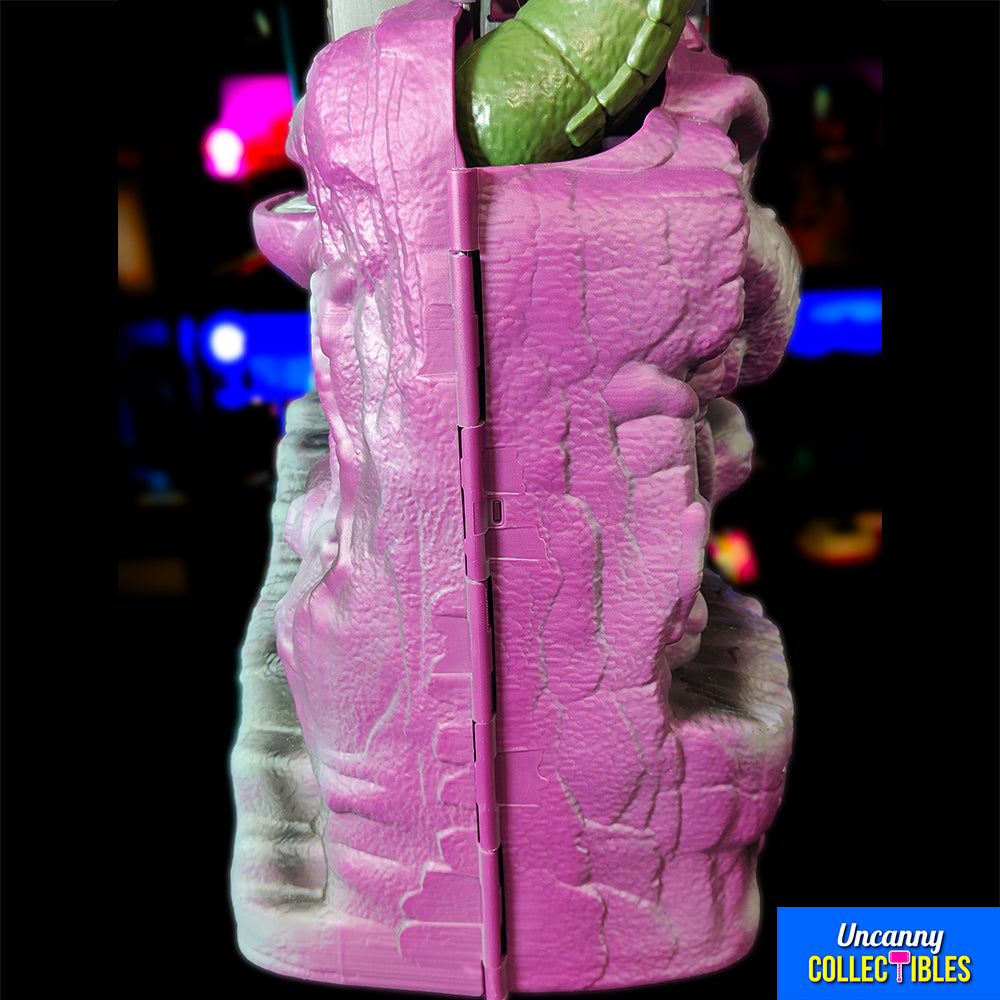 Mattel Masters of the Universe Origins Snake Mountain playset, grey castle with purple accents, snake head at top, wolf head entrance