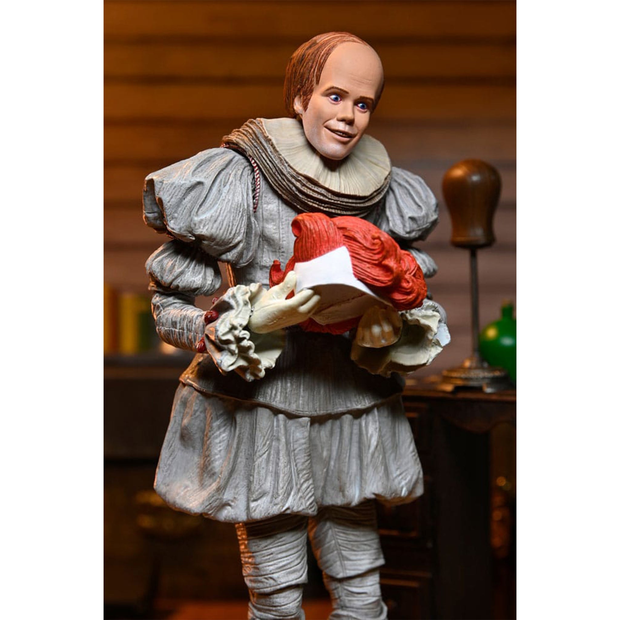 NECA IT Welcome to Derry Ultimate Bob Gray as Pennywise Action Figure – IT, NECA, 18 cm, brand new collector item, Uncanny Collectibles Dublin Ireland