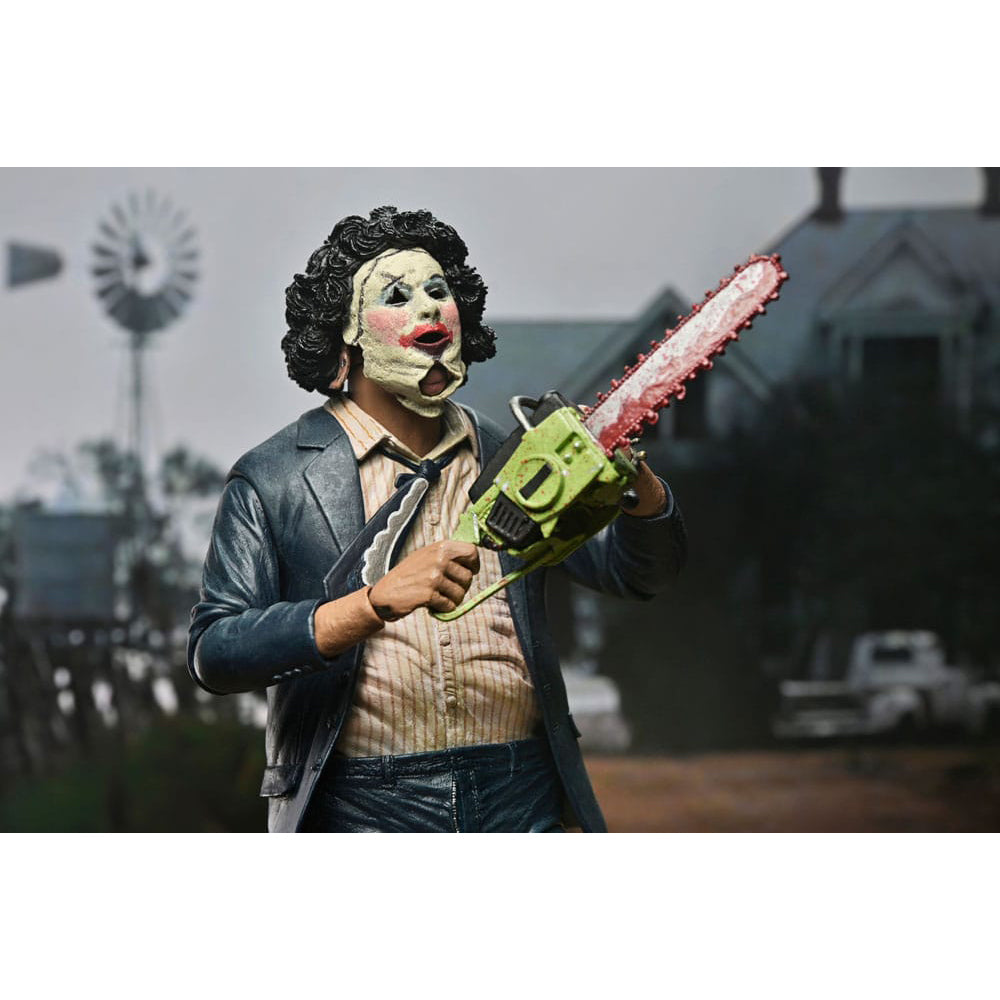 NECA Texas Chainsaw Massacre Ultimate Pretty Woman Leatherface 50th Anniversary action figure, 18cm tall, featuring suit and makeup with windswept jacket