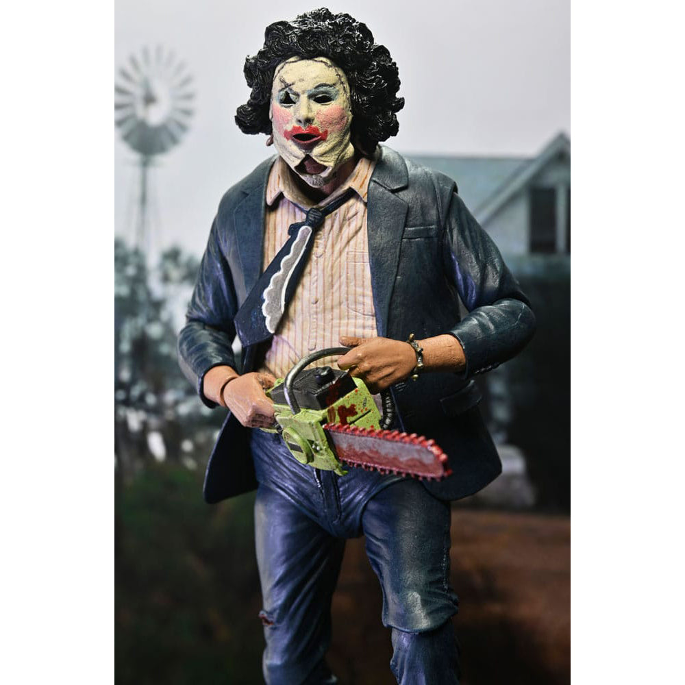 NECA Texas Chainsaw Massacre Ultimate Pretty Woman Leatherface 50th Anniversary action figure, 18cm tall, featuring suit and makeup with windswept jacket