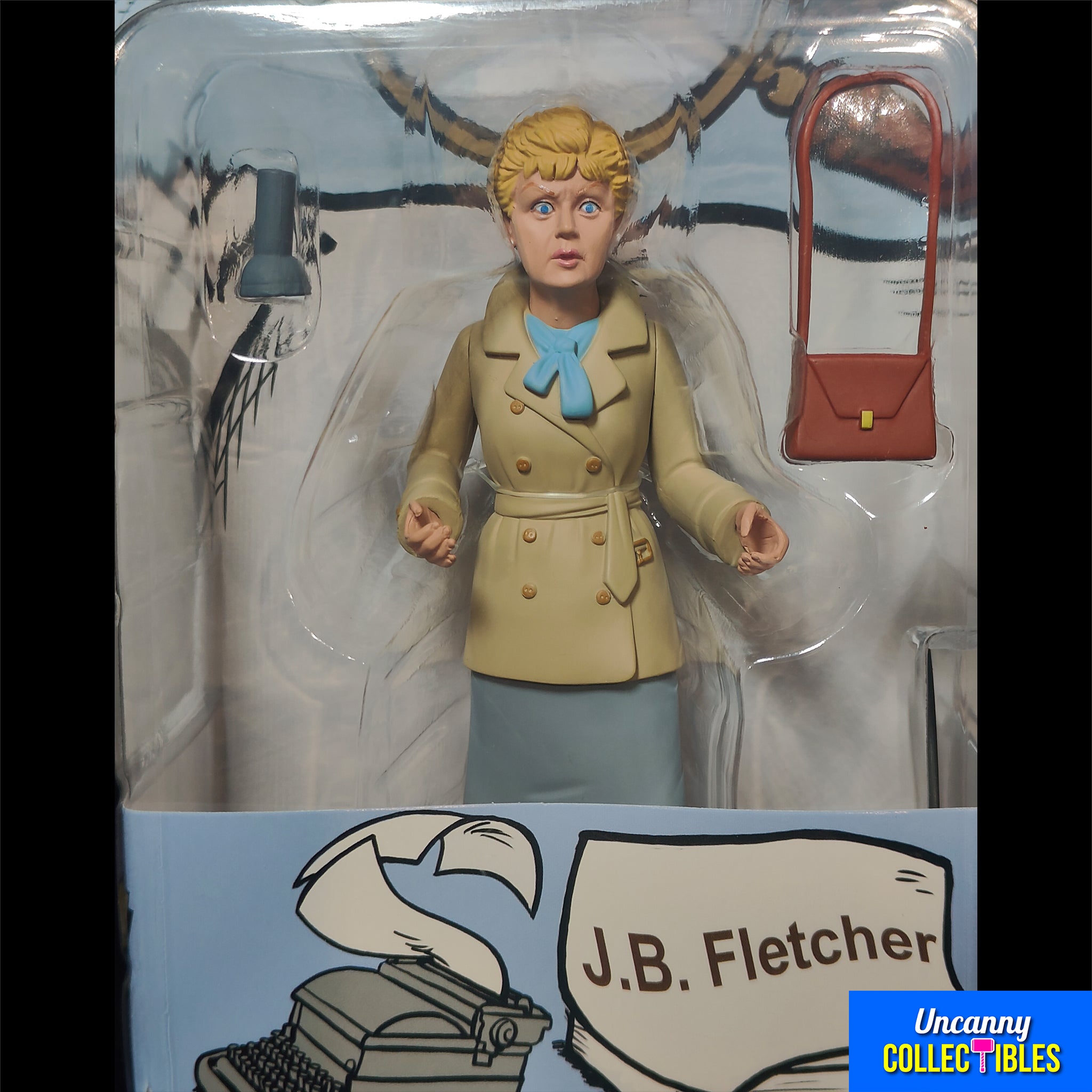 Carded NECA Toony Classics 15 cm figure of Jessica Fletcher from Murder, She Wrote, in a cartoon-style sculpt with a tan coat, blue scarf, brown handbag accessory, and illustrated backing card.