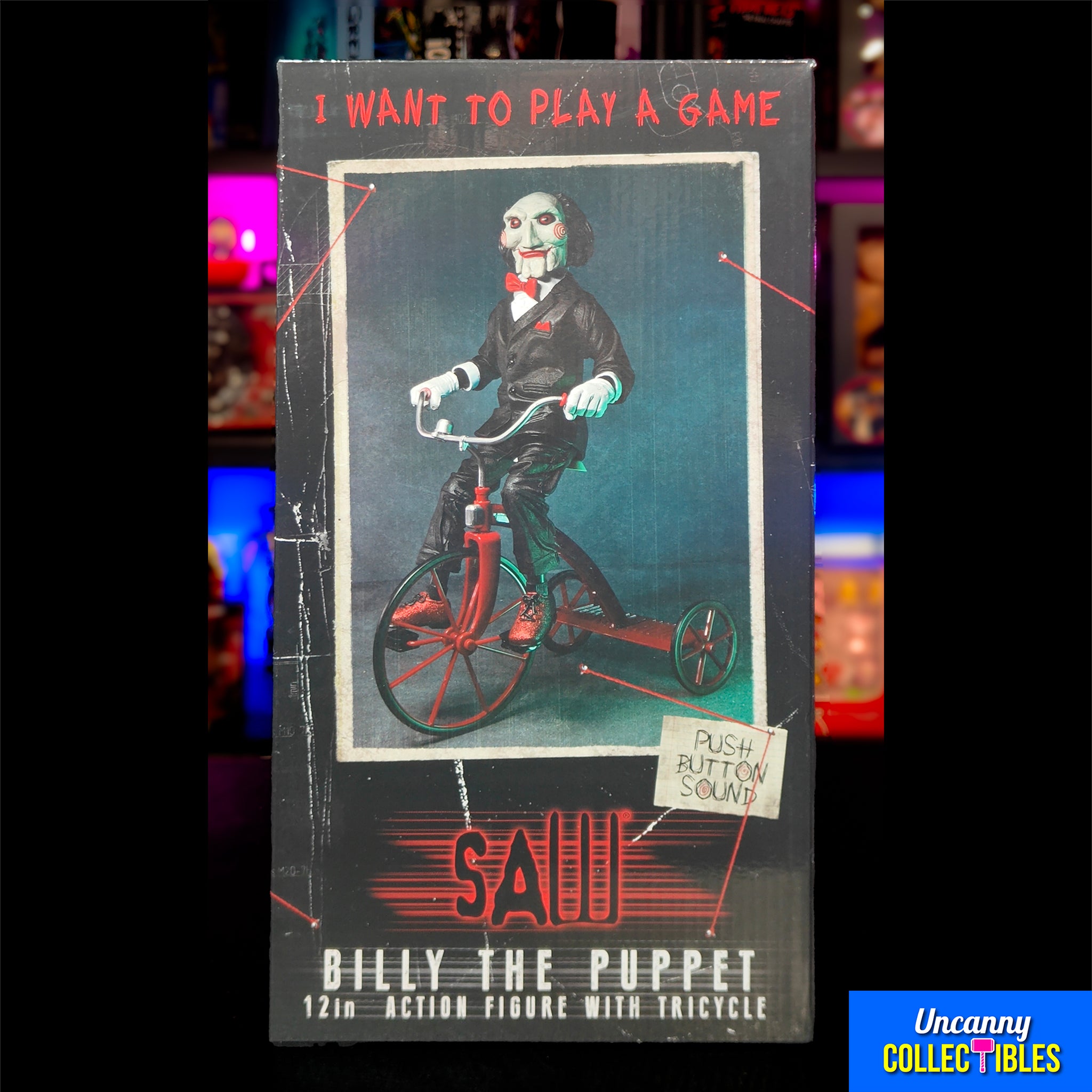 NECA Saw Billy The Puppet On Tricycle With Sound Action Figure – Saw, NECA, 30 cm, brand new collector item, Uncanny Collectibles Dublin Ireland