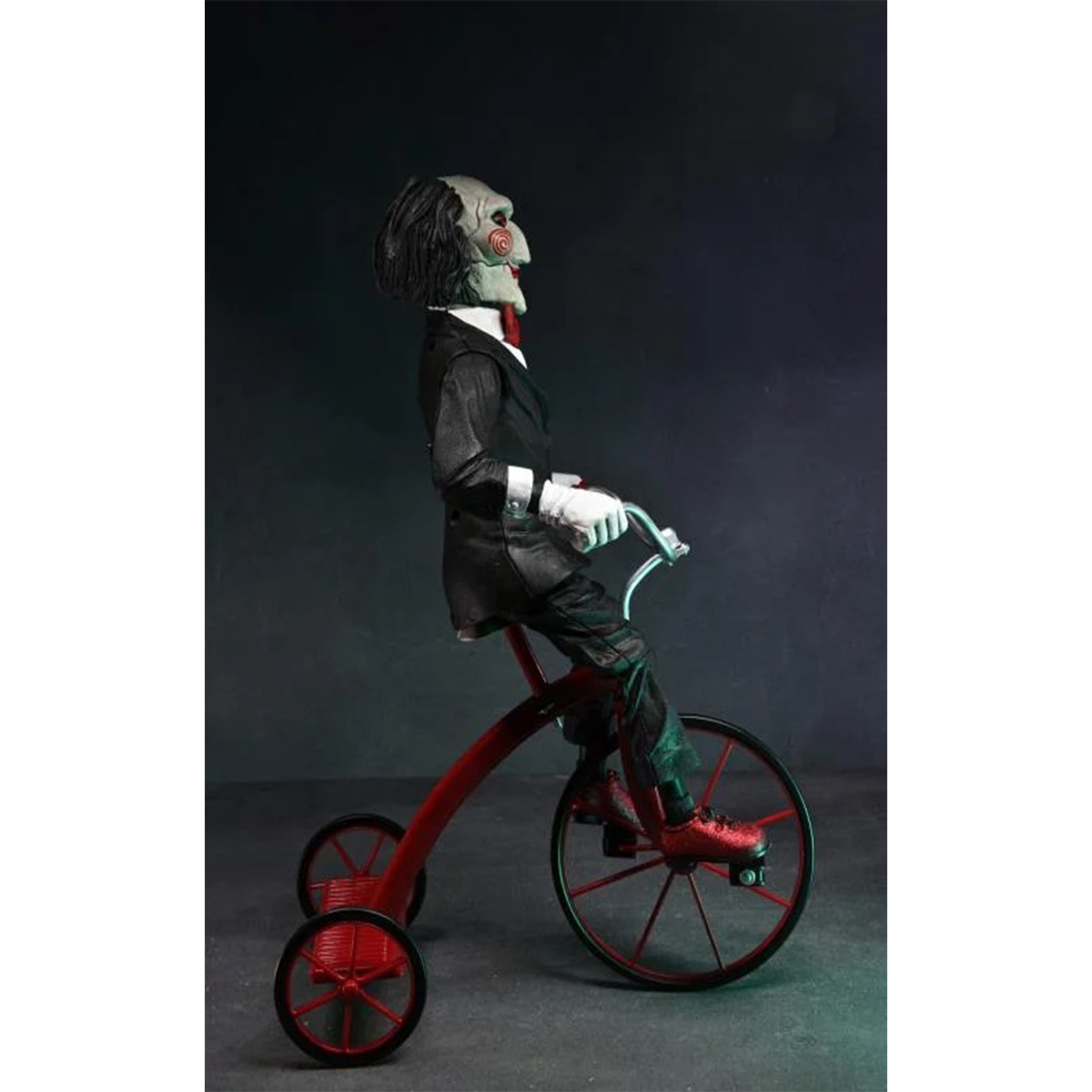 NECA Saw Billy The Puppet On Tricycle With Sound Action Figure – Saw, NECA, 30 cm, brand new collector item, Uncanny Collectibles Dublin Ireland