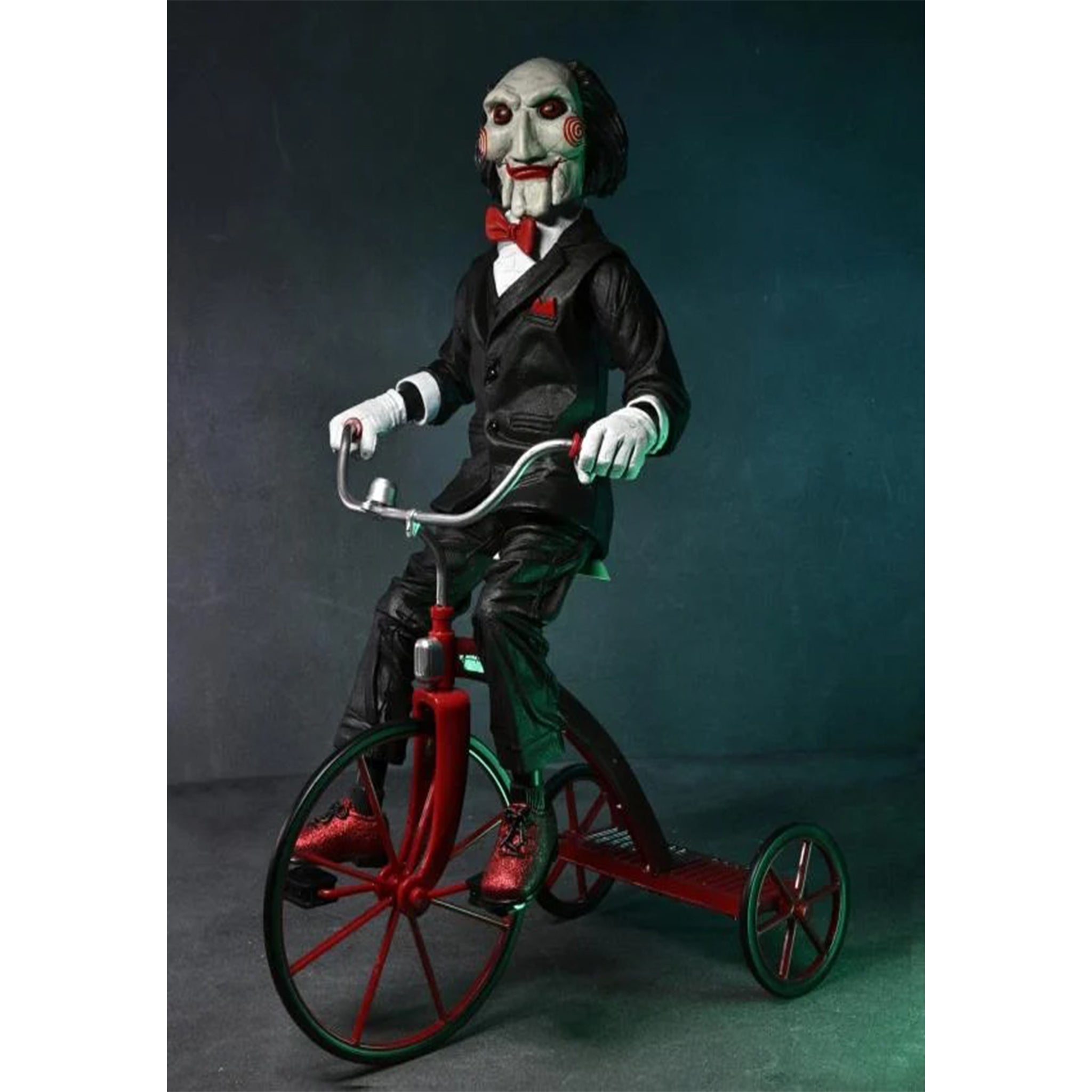 NECA Saw Billy The Puppet On Tricycle With Sound Action Figure – Saw, NECA, 30 cm, brand new collector item, Uncanny Collectibles Dublin Ireland